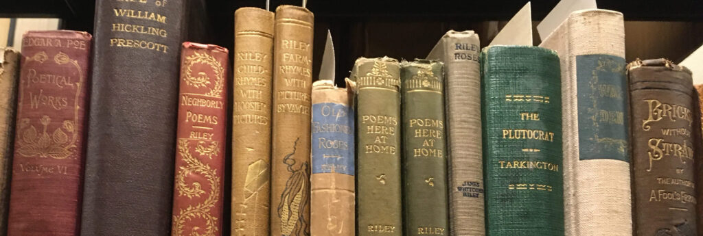 A shelf of rare books in the archives collection.