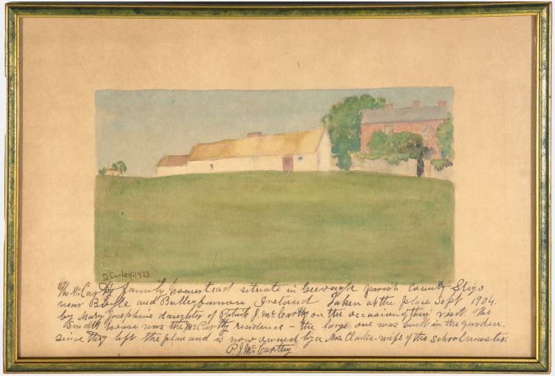 A framed artwork of a white building on top of a green hill, with a brick building to the right behind trees. Below is a handwritten caption in cursive. 