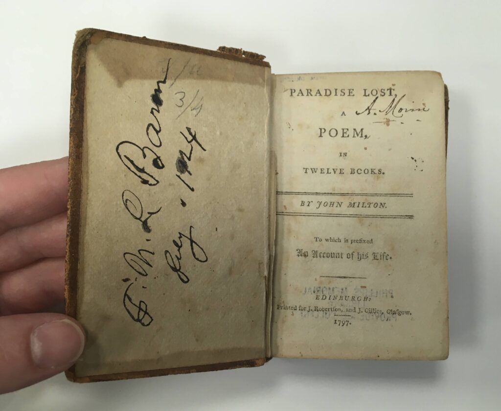 Small copy of Paradise Lost by John Milton, front cover open to title page